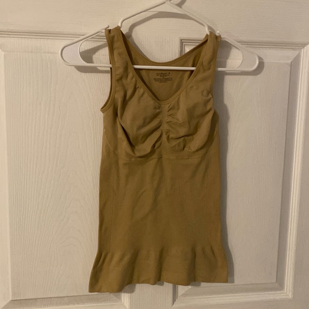 Camishaper size M. Really shapes and holds. Make all outfits look great